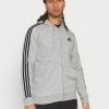 Adidas Performance ESSENTIALS 3 STRIPES FULL ZIP - Zip-up Sweatshirt - Medium Grey Heather -adidas Performance Shop 05fe2a41b13f4ae8bab21e9952155894