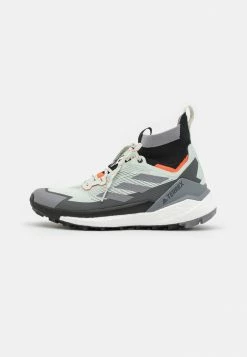 Adidas Performance TERREX FREE HIKER - Hiking Shoes - Linen Green/crystal White/impact Orange