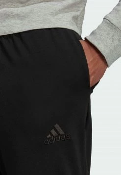 Adidas Performance ESSENTIALS SINGLE TAPERED - Tracksuit Bottoms - Black 11 Adidas Performance ESSENTIALS SINGLE TAPERED - Tracksuit Bottoms - Black -adidas Performance Shop 26dc47929df04aeebd780ba0de2f7c95