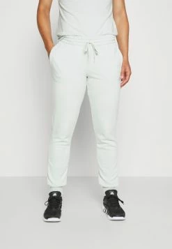 Adidas Performance ESSENTIALS FRENCH TERRY LOGO - Tracksuit Bottoms - Linen Green/white