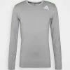 Adidas Performance PRIMEGREEN COMPRESSION LONG SLEEVE T-SHIRT - Long Sleeved Top - Solid Grey 2 Adidas Performance PRIMEGREEN COMPRESSION LONG SLEEVE T-SHIRT - Long Sleeved Top - Solid Grey -adidas Performance Shop 76d2821c2d5b42c4915dde37b300442a
