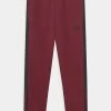 Adidas Performance TIRO UNISEX - Tracksuit Bottoms - Shadow Red
