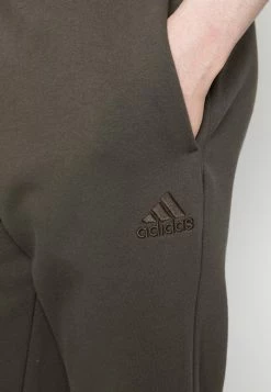 Adidas Performance UNISEX - Tracksuit Bottoms - Shadow Olive -adidas Performance Shop b735215388b745bbb738ec746eebac55