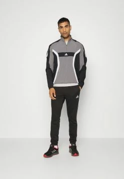 Adidas Performance ESSENTIALS TAPERED CUFF - Tracksuit Bottoms - Black -adidas Performance Shop b7be38301404447b88edf3d24c5f9c93