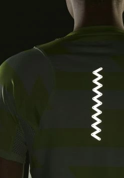 Adidas Performance FAST ALLOVER - Print T-shirt - Green -adidas Performance Shop bff5e28709df4da392ef90897ad6bcfe