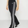Adidas Performance FLARED - Tracksuit Bottoms - Black -adidas Performance Shop e0148291ce8641f59c18dbc6277db105
