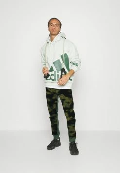 Adidas Performance NATURE AOP POLAR FLEECE - Tracksuit Bottoms - Orbit Green/green Oxide -adidas Performance Shop e3fe495359dc42f8991189adbb7144c4