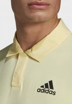 Adidas Performance NEW YORK TENNIS - Polo Shirt - Yellow -adidas Performance Shop fcbc452b2a124aaca71ff4e023aab23a